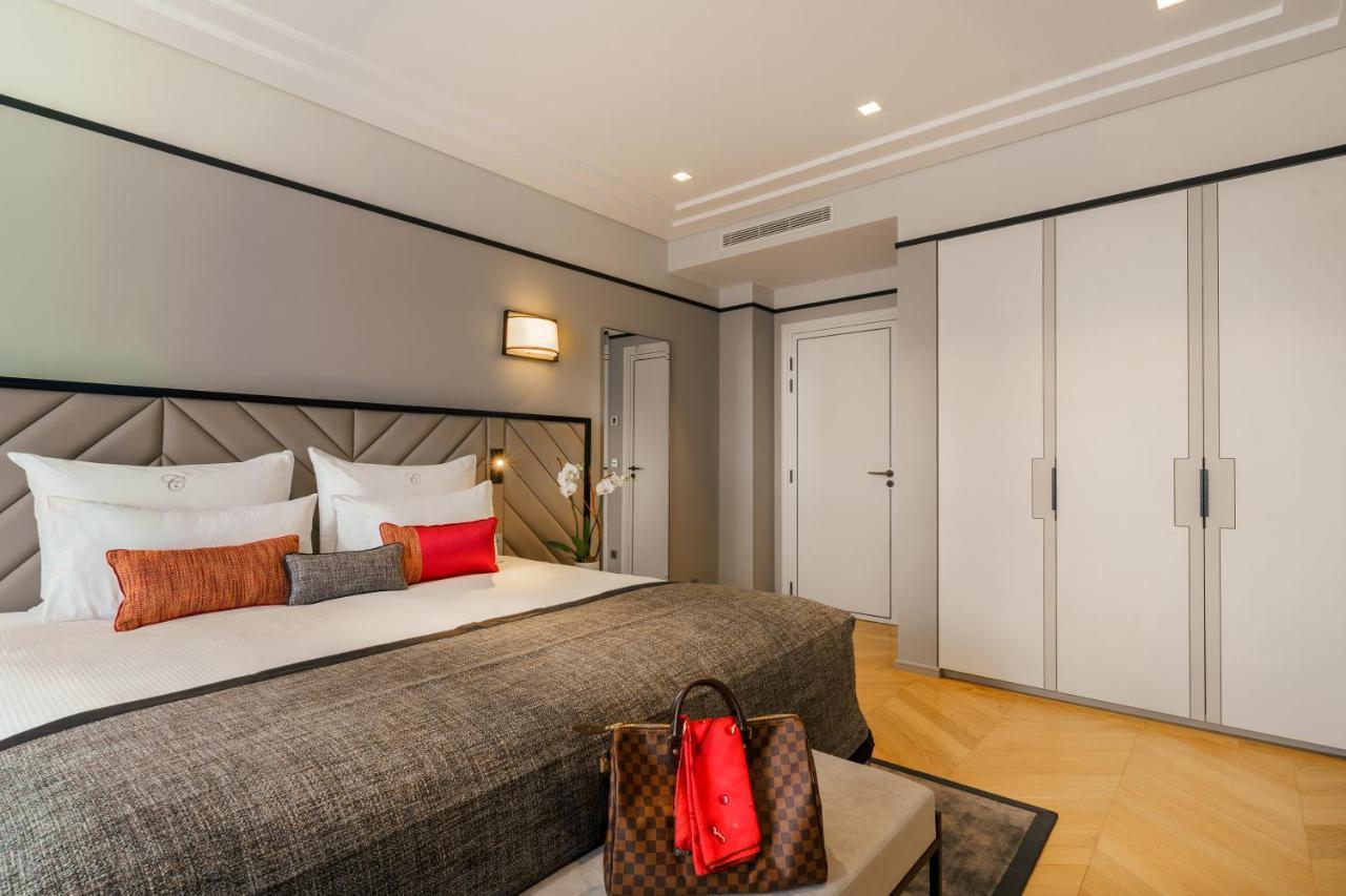 ホテル フレイザー スイート ル クラリッジ シャンゼリゼ パリ エクステリア 写真 A bedroom at the hotel