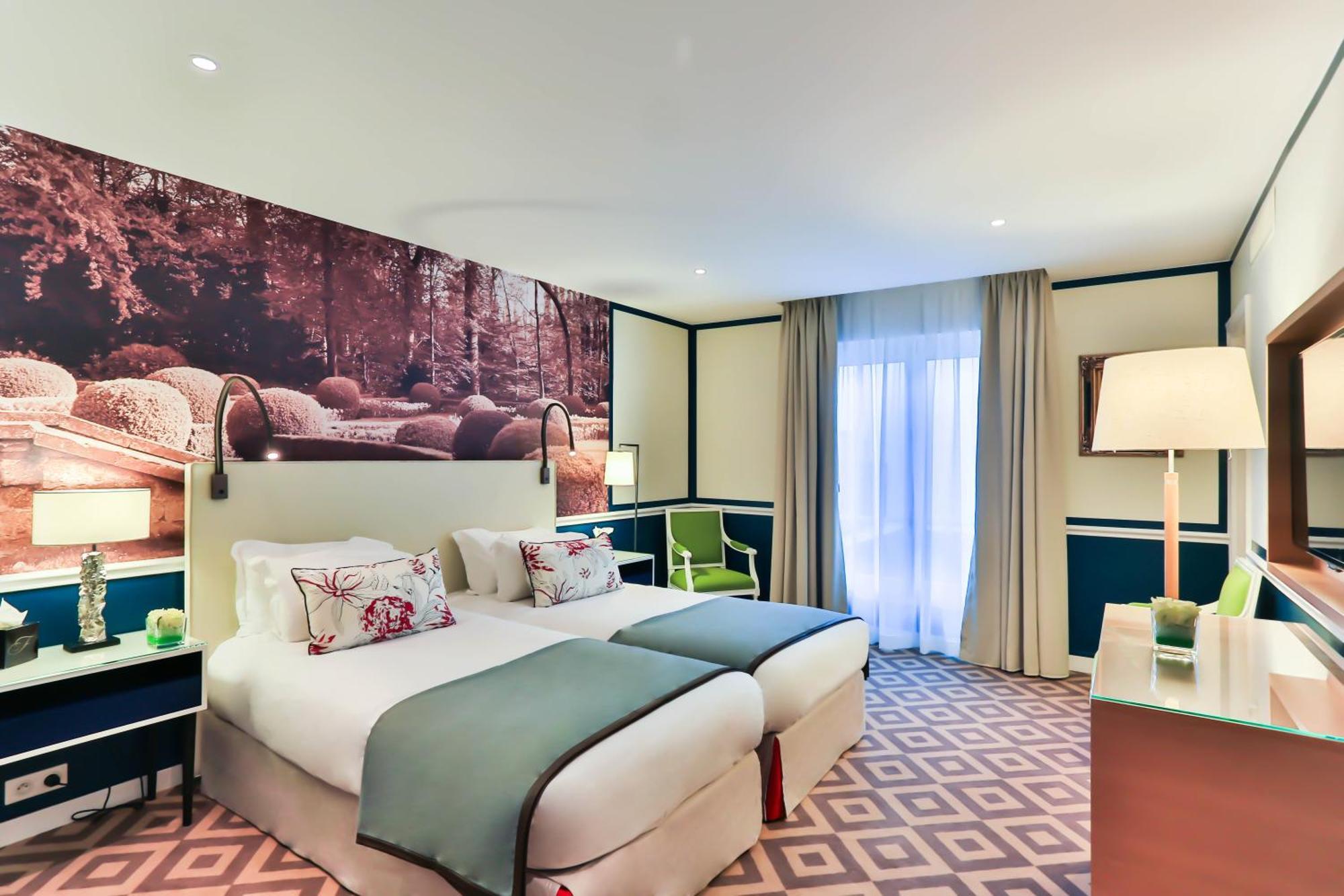 ホテル フレイザー スイート ル クラリッジ シャンゼリゼ パリ エクステリア 写真 A room at the hotel