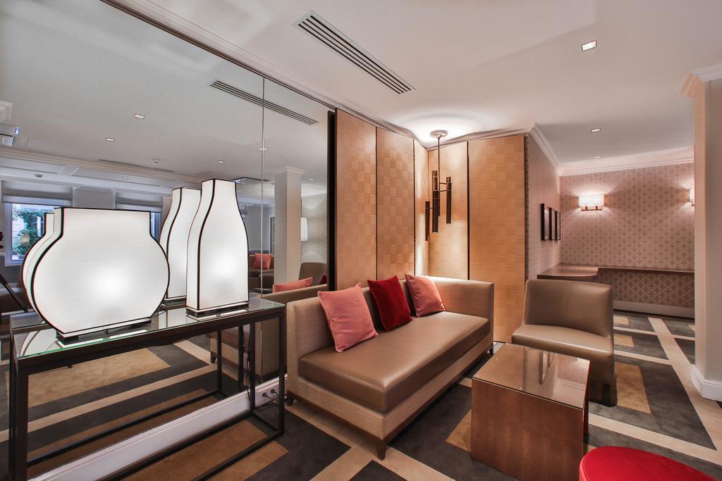 ホテル フレイザー スイート ル クラリッジ シャンゼリゼ パリ エクステリア 写真 The interior of the lounge